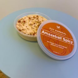 Spicy Amazeball Spread vegan spicy cheeseball alternative with Hot Pepper Peach Jam and Thai Chili Pepper topping