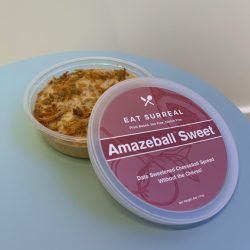 Sweet Amazeball Spread vegan sweet cheeseball alternative with fruit jam swirl and toasted coconut topping